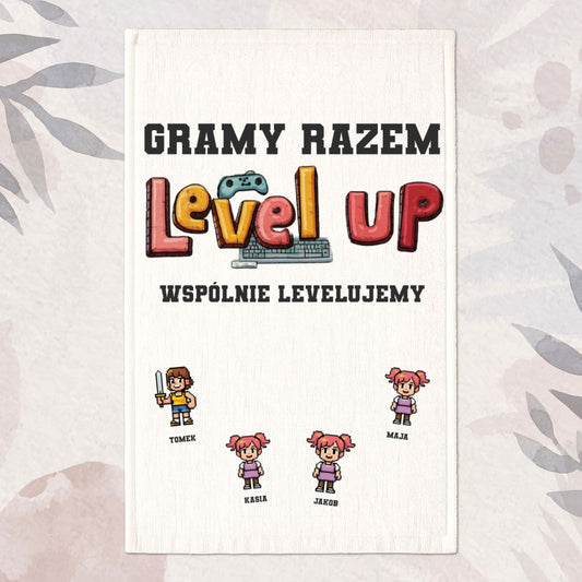 Ręcznik plażowy z napisem „Level Up” i spersonalizowanymi postaciami w stylu retro gaming.